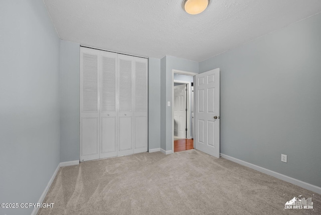 7200 Kiska Cir, Anchorage, AK 99504 - unfurnished bedroom featuring carpet, a closet, and a textured ceiling