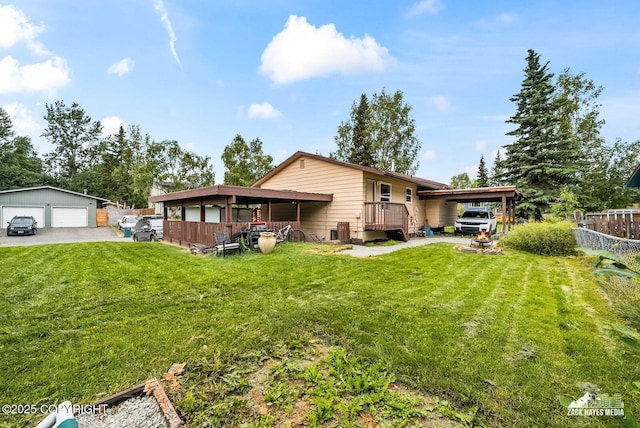 7200 Kiska Cir, Anchorage, AK 99504 - back of house with a detached garage and an outbuilding