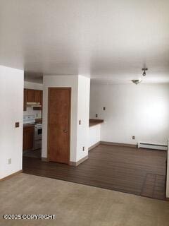 1911 Marthas Vineyard Cir, Anchorage, AK 99507 - spare room featuring a baseboard radiator and baseboards