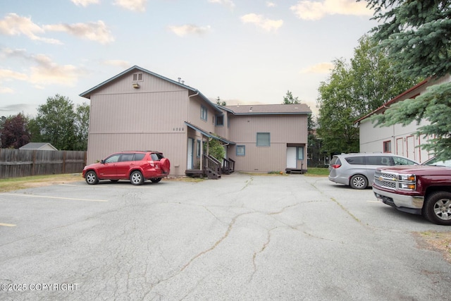 1911 Marthas Vineyard Cir, Anchorage, AK 99507 - view of front of property featuring uncovered parking and entry steps