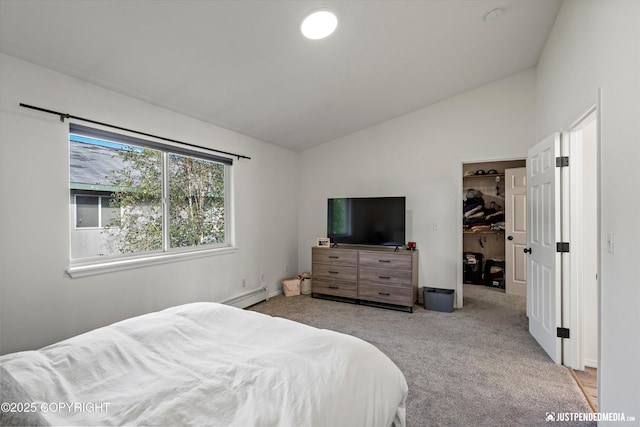 1544 State St, Anchorage, AK 99504 - carpeted bedroom featuring lofted ceiling, a spacious closet, and a baseboard radiator