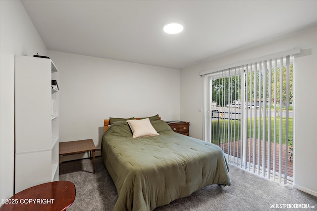 1544 State St, Anchorage, AK 99504 - carpeted bedroom featuring access to exterior and baseboard heating
