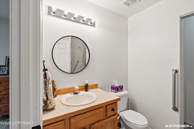 1544 State St, Anchorage, AK 99504 - bathroom featuring vanity and toilet