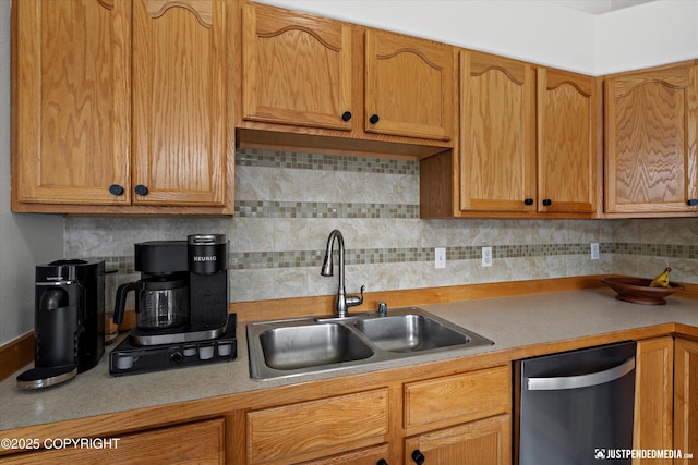 1544 State St, Anchorage, AK 99504 - kitchen with light countertops, backsplash, and stainless steel dishwasher