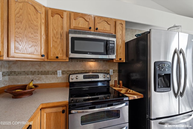 1544 State St, Anchorage, AK 99504 - kitchen featuring appliances with stainless steel finishes, light countertops, and backsplash