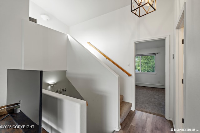1544 State St, Anchorage, AK 99504 - stairs featuring a chandelier and wood finished floors
