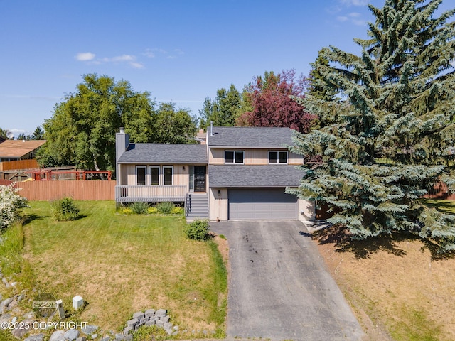 9645 Nulato Cir, Eagle River, AK 99577 - tri-level home with driveway, an attached garage, a chimney, and roof with shingles