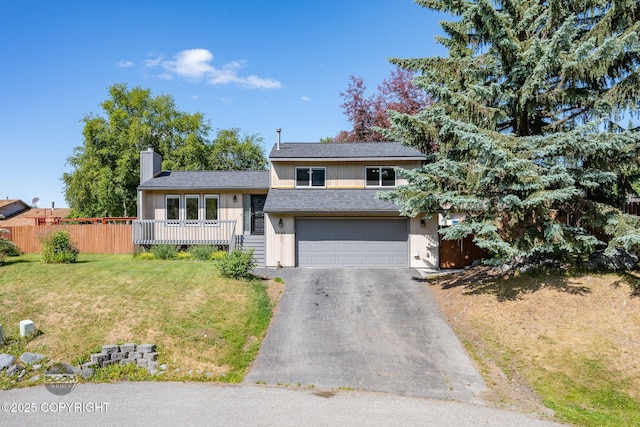 9645 Nulato Cir, Eagle River, AK 99577 - tri-level home with asphalt driveway, a chimney, an attached garage, and roof with shingles
