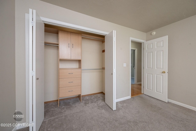 9645 Nulato Cir, Eagle River, AK 99577 - unfurnished bedroom with light carpet and a closet