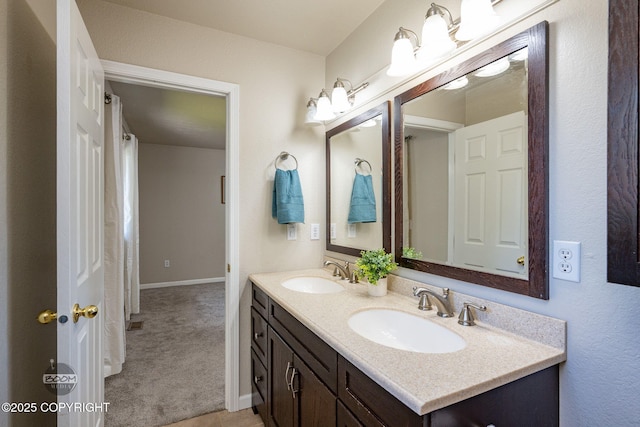 9645 Nulato Cir, Eagle River, AK 99577 - full bath with double vanity and baseboards