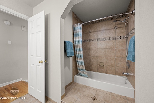 9645 Nulato Cir, Eagle River, AK 99577 - bathroom featuring shower / bath combination with curtain and tile patterned flooring