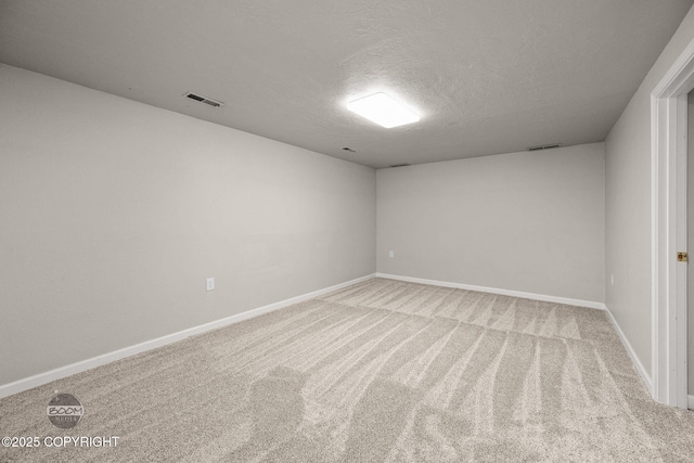 9645 Nulato Cir, Eagle River, AK 99577 - spare room with a textured ceiling and carpet flooring