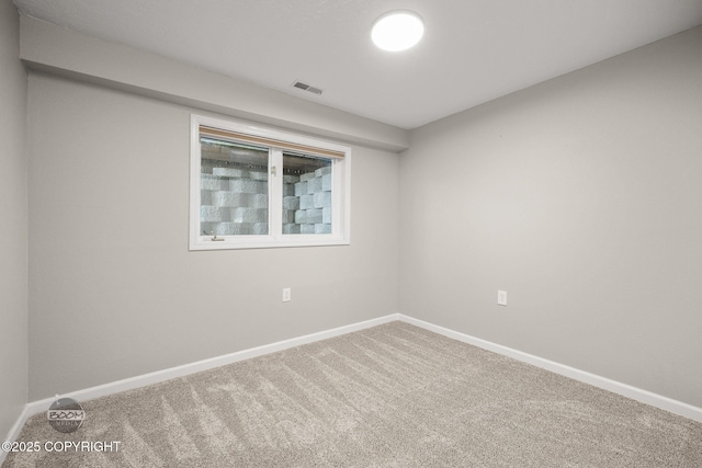 9645 Nulato Cir, Eagle River, AK 99577 - unfurnished room featuring carpet and baseboards