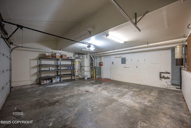 9645 Nulato Cir, Eagle River, AK 99577 - garage featuring water heater and a garage door opener