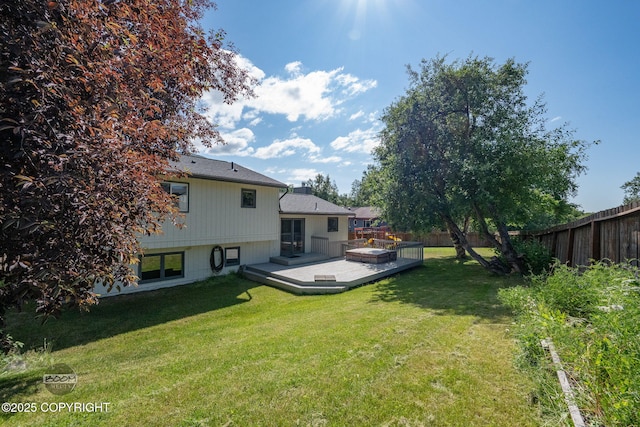 9645 Nulato Cir, Eagle River, AK 99577 - fenced backyard featuring a wooden deck