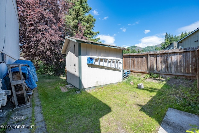 9645 Nulato Cir, Eagle River, AK 99577 - view of yard with a storage unit and a mountain view