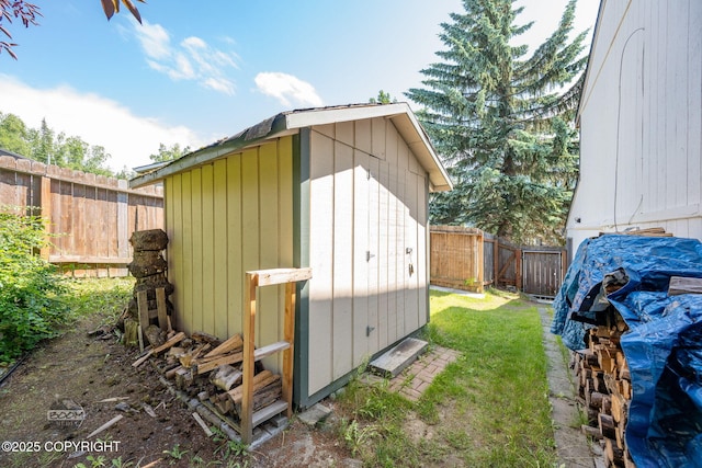 9645 Nulato Cir, Eagle River, AK 99577 - view of shed with a fenced backyard