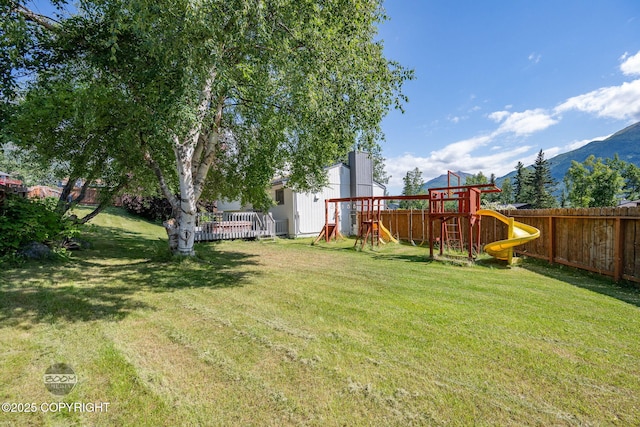 9645 Nulato Cir, Eagle River, AK 99577 - view of yard with a playground and a mountain view