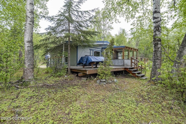 1801 W That Rd, Wasilla, AK 99623 - rear view of house with a deck