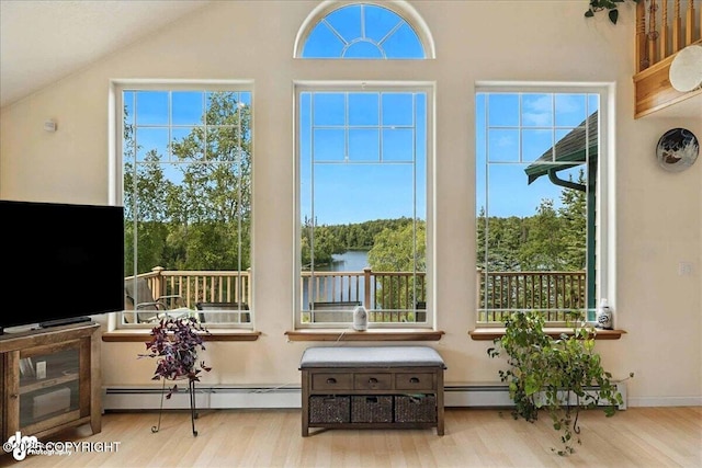 48350 Lakeside Ave, Soldotna, AK 99669 - sunroom featuring baseboard heating and vaulted ceiling