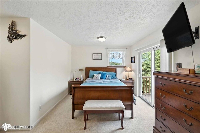 48350 Lakeside Ave, Soldotna, AK 99669 - bedroom featuring access to outside, light carpet, and a textured ceiling