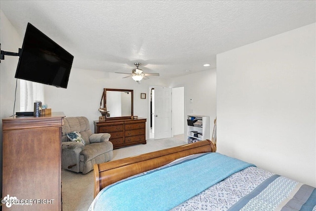 48350 Lakeside Ave, Soldotna, AK 99669 - bedroom with carpet flooring, a textured ceiling, ceiling fan, and recessed lighting