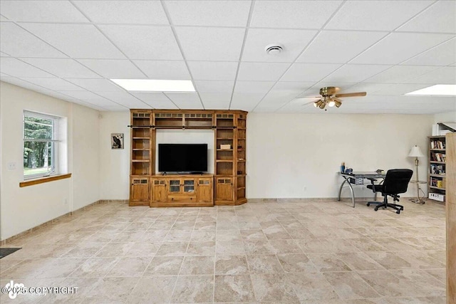 48350 Lakeside Ave, Soldotna, AK 99669 - living room featuring a paneled ceiling, a ceiling fan, and an office area