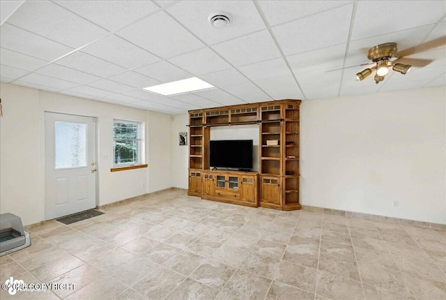 48350 Lakeside Ave, Soldotna, AK 99669 - unfurnished living room with a drop ceiling and ceiling fan