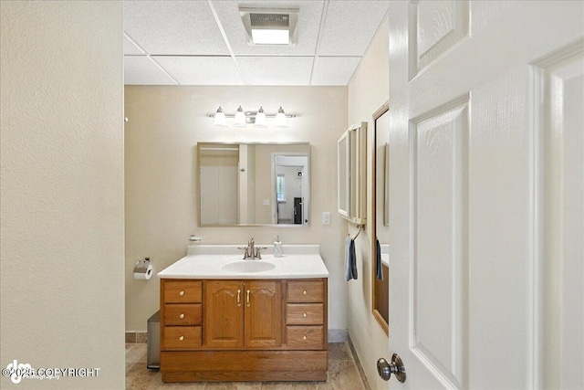 48350 Lakeside Ave, Soldotna, AK 99669 - bathroom featuring a drop ceiling and vanity