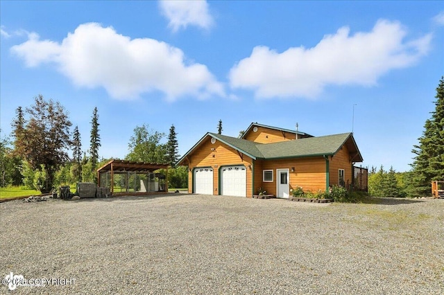 48350 Lakeside Ave, Soldotna, AK 99669 - view of front of property with driveway and a garage