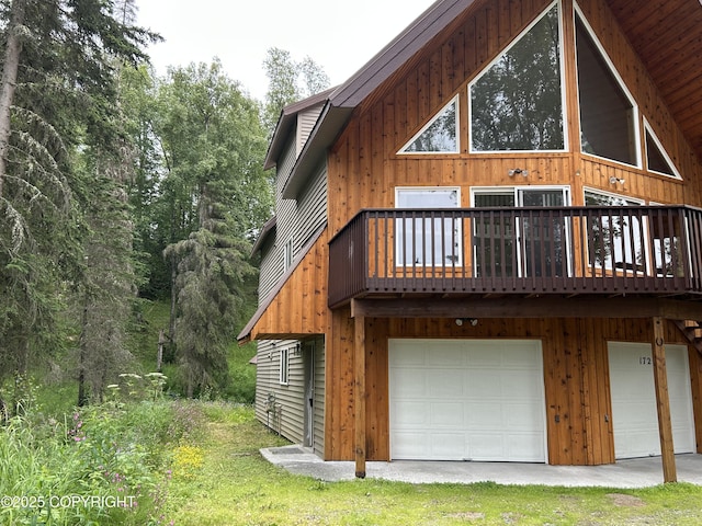 172 Linda Ln, Soldotna, AK 99669 - rear view of house with an attached garage