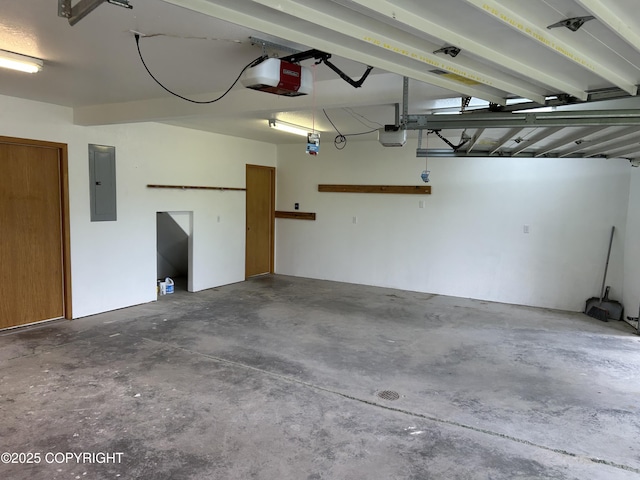 172 Linda Ln, Soldotna, AK 99669 - garage featuring electric panel and a garage door opener