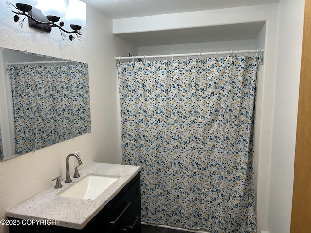 172 Linda Ln, Soldotna, AK 99669 - full bathroom featuring vanity and a shower with shower curtain