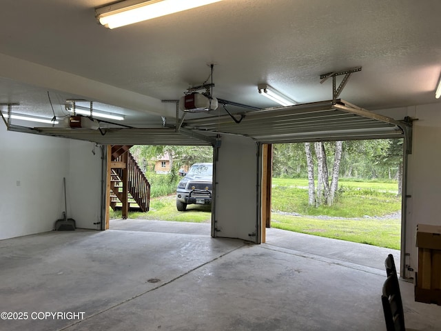 172 Linda Ln, Soldotna, AK 99669 - garage featuring a garage door opener