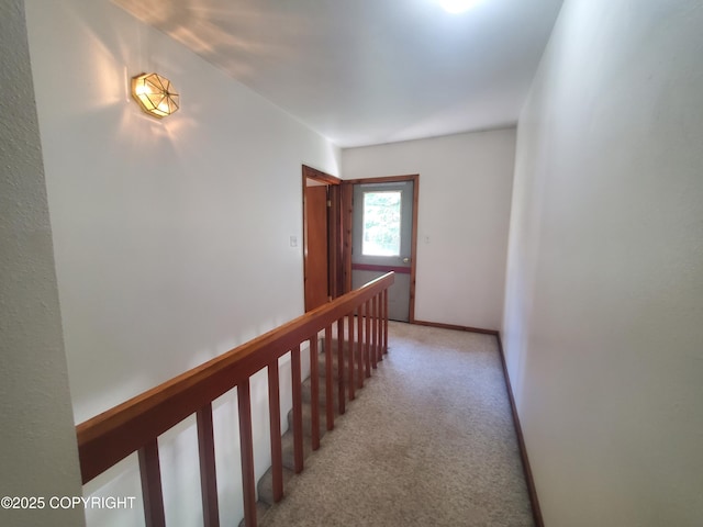 35196 Nordic Ct, Anchor Point, AK 99556 - hallway with light carpet and an upstairs landing