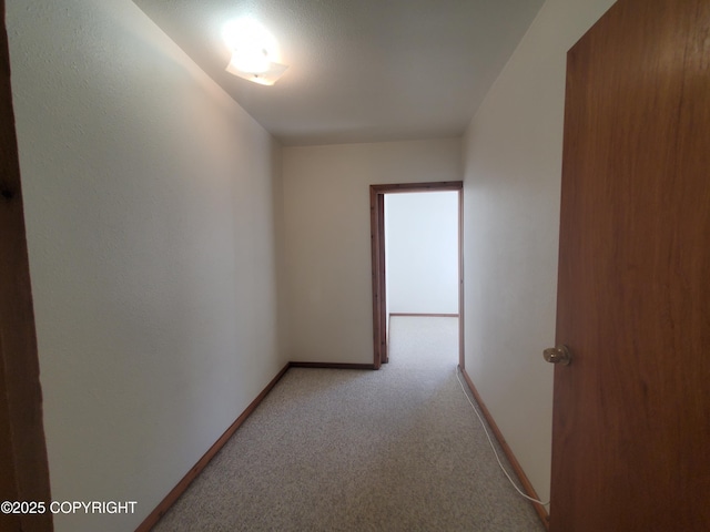 35196 Nordic Ct, Anchor Point, AK 99556 - hall featuring light carpet and baseboards