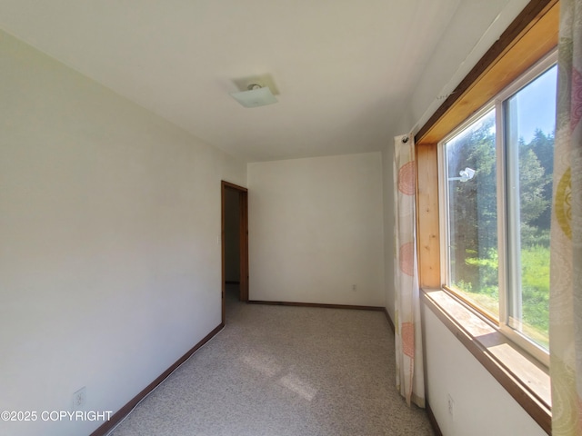 35196 Nordic Ct, Anchor Point, AK 99556 - empty room with light carpet and baseboards