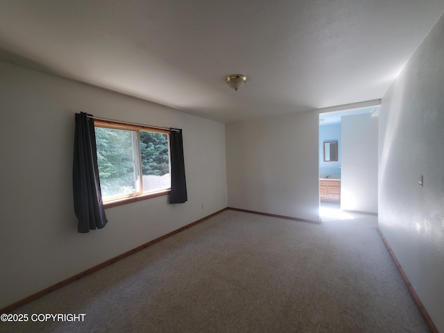 35196 Nordic Ct, Anchor Point, AK 99556 - carpeted empty room featuring baseboards