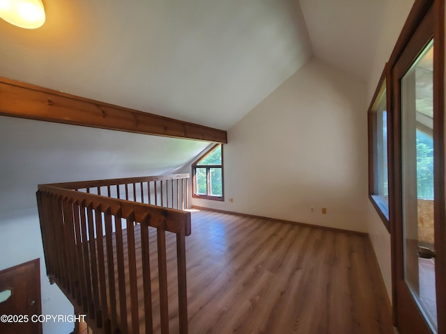 35196 Nordic Ct, Anchor Point, AK 99556 - staircase with wood finished floors and baseboards