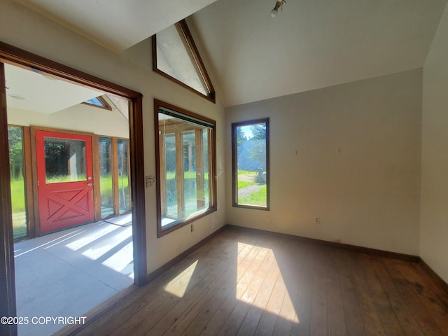 35196 Nordic Ct, Anchor Point, AK 99556 - unfurnished room featuring wood-type flooring and lofted ceiling