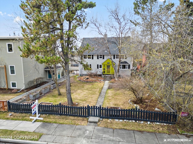 1334 K St, Anchorage, AK 99501 - view of front facade with a fenced front yard