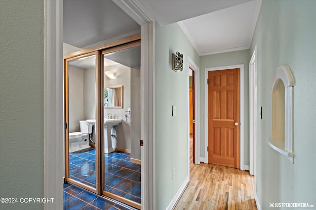 1334 K St, Anchorage, AK 99501 - corridor featuring crown molding and wood finished floors