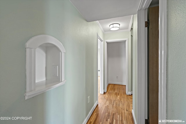1334 K St, Anchorage, AK 99501 - hallway featuring crown molding and light wood finished floors