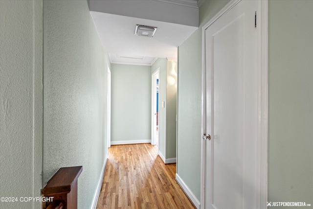 1334 K St, Anchorage, AK 99501 - hallway with hardwood / wood-style flooring, attic access, and crown molding