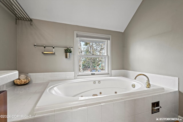 1334 K St, Anchorage, AK 99501 - full bath featuring a tub with jets and vaulted ceiling