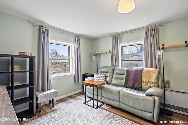 1334 K St, Anchorage, AK 99501 - living room featuring wood finished floors and baseboards