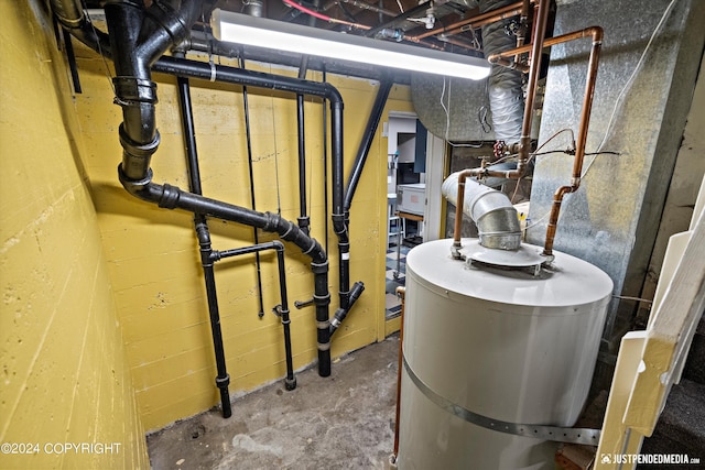 1334 K St, Anchorage, AK 99501 - utility room featuring water heater