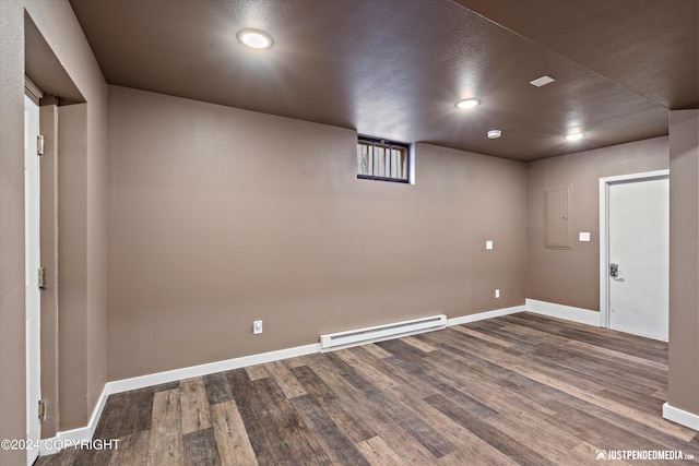1334 K St, Anchorage, AK 99501 - finished basement featuring baseboard heating, dark wood-type flooring, and recessed lighting