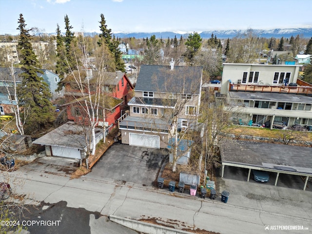 1334 K St, Anchorage, AK 99501 - aerial perspective of suburban area with mountains