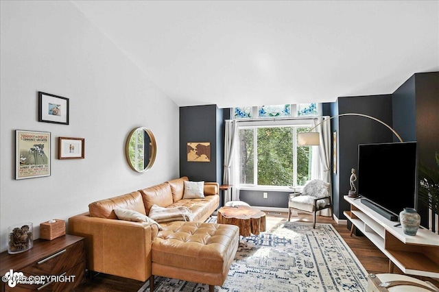 21009 River Park Dr, Eagle River, AK 99577 - living room featuring dark wood-style floors and vaulted ceiling